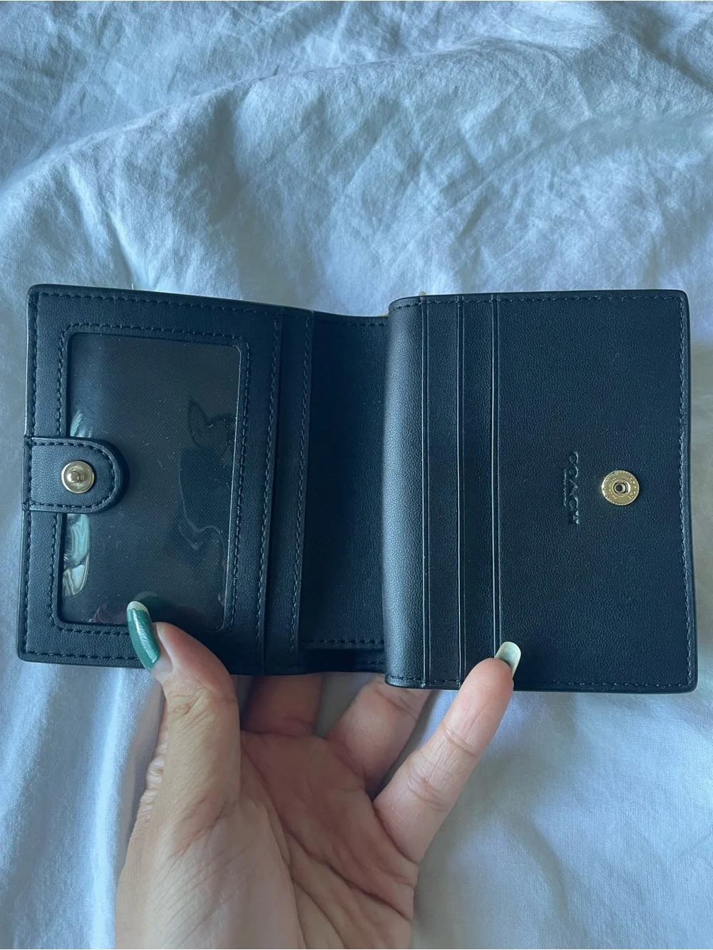 COACH Black Pebbled Leather Zip Card Holder with Gold Logo